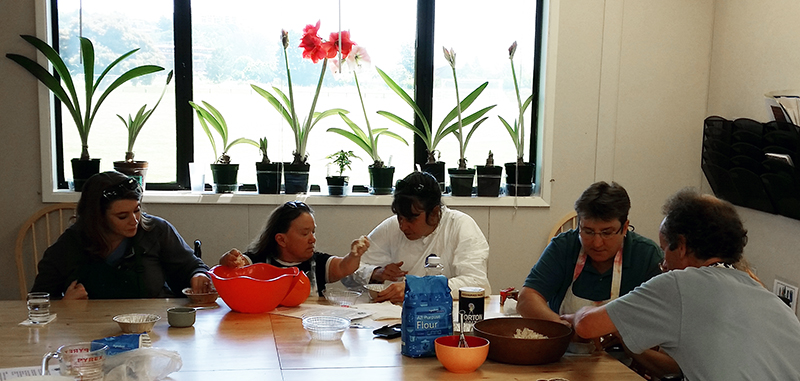 Photo of group mixing cooking ingredients