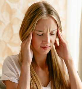 Photo of woman with headache